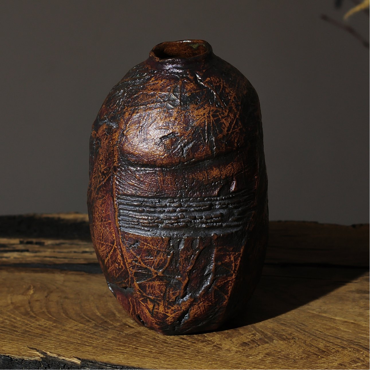 textured sculptural vase with matte glaze