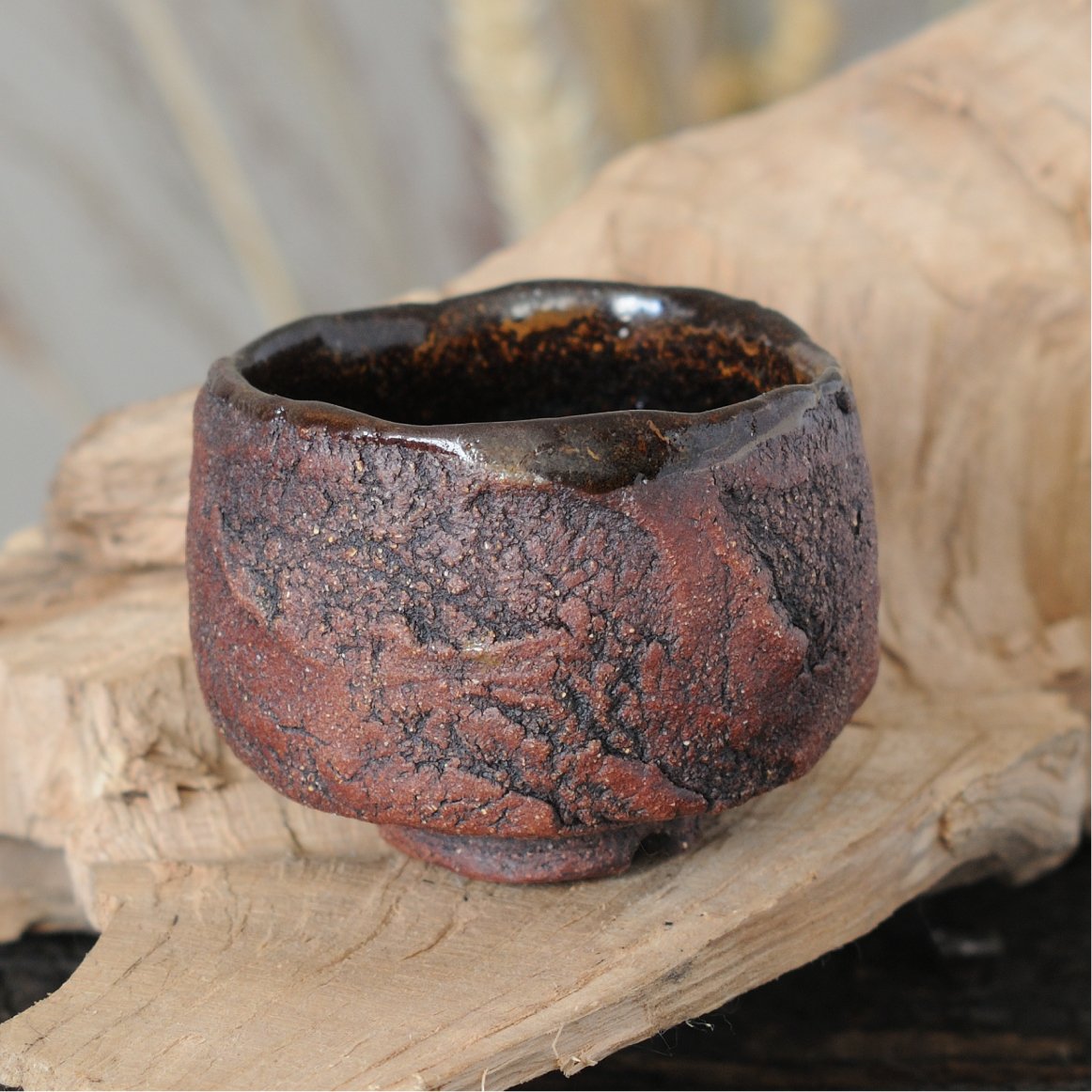 Ceramic kurinuki cup detail showing carved surface