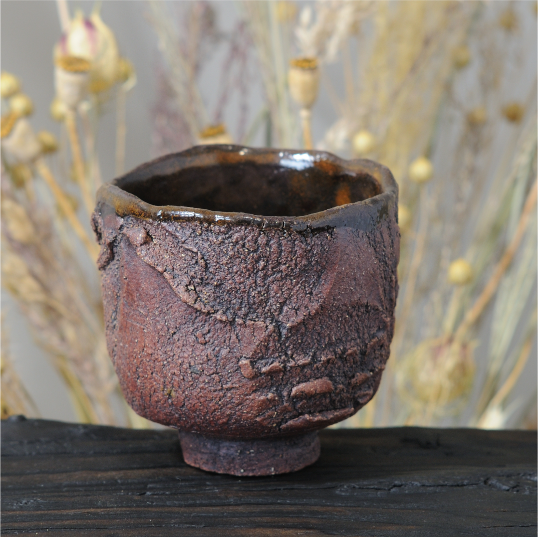 footed ceramic yunomi cup textured surface front view