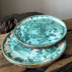 Handmade ceramic serving plate with blue and white glaze