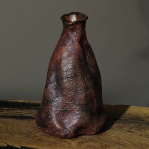 Front view of handmade sculptural ceramic vase