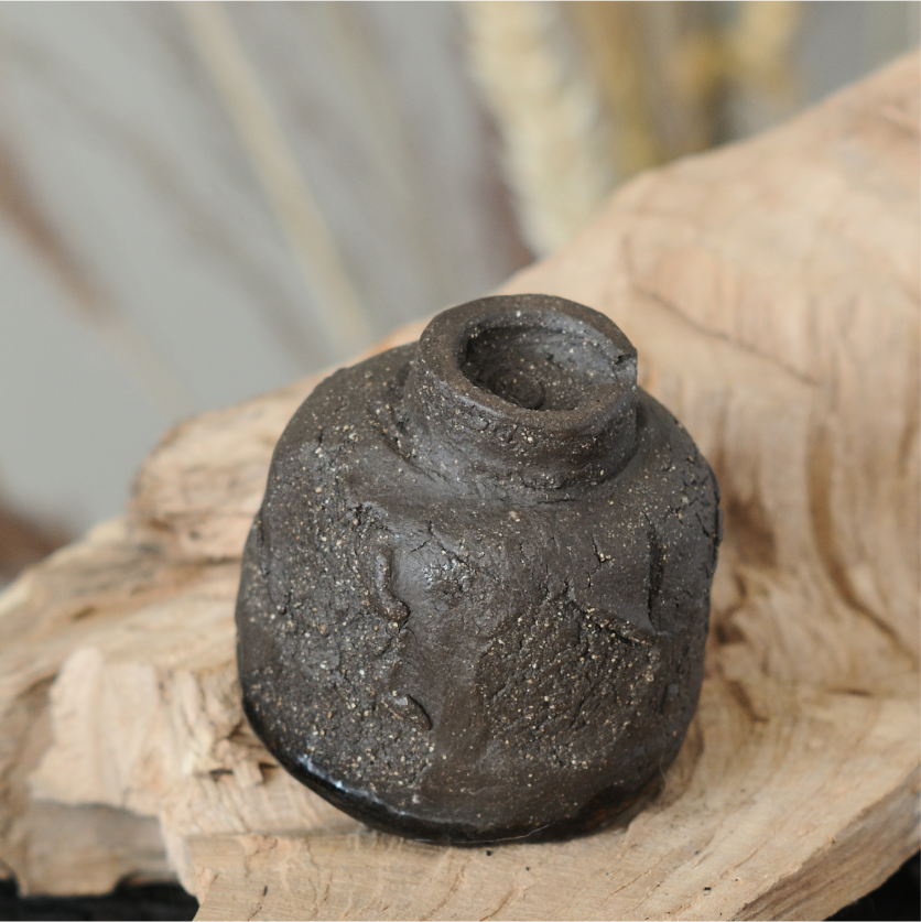 Small handmade kurinuki guinomi tea cup, side view