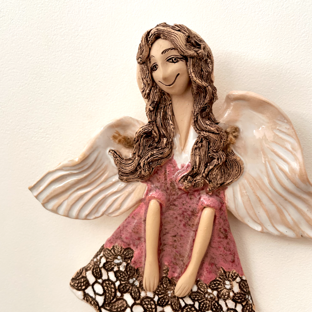 ceramic angel wall hanging detail