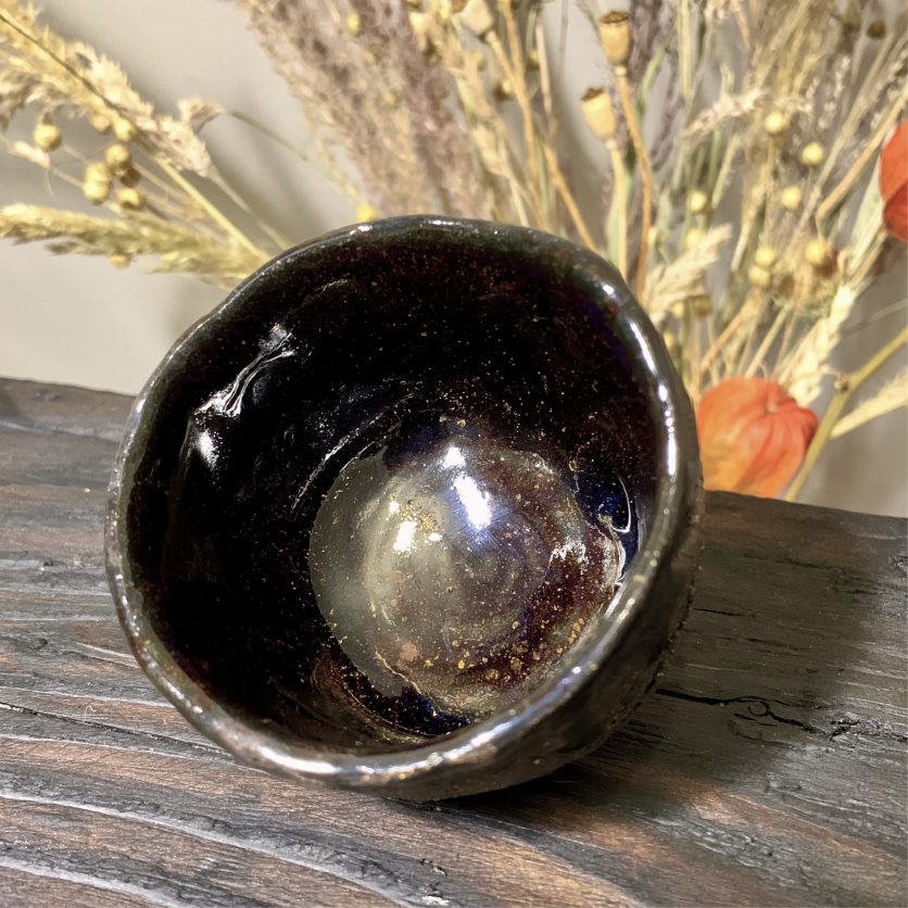 Wabi sabi style ceramic guinomi cup, black clay