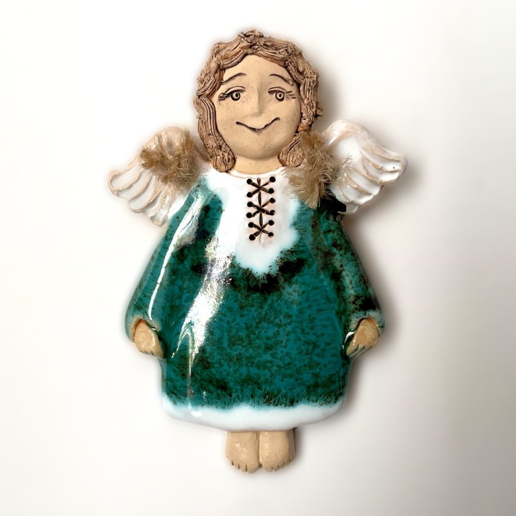 handmade green ceramic angel decorative detail