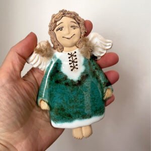 green ceramic angel wall decor front view