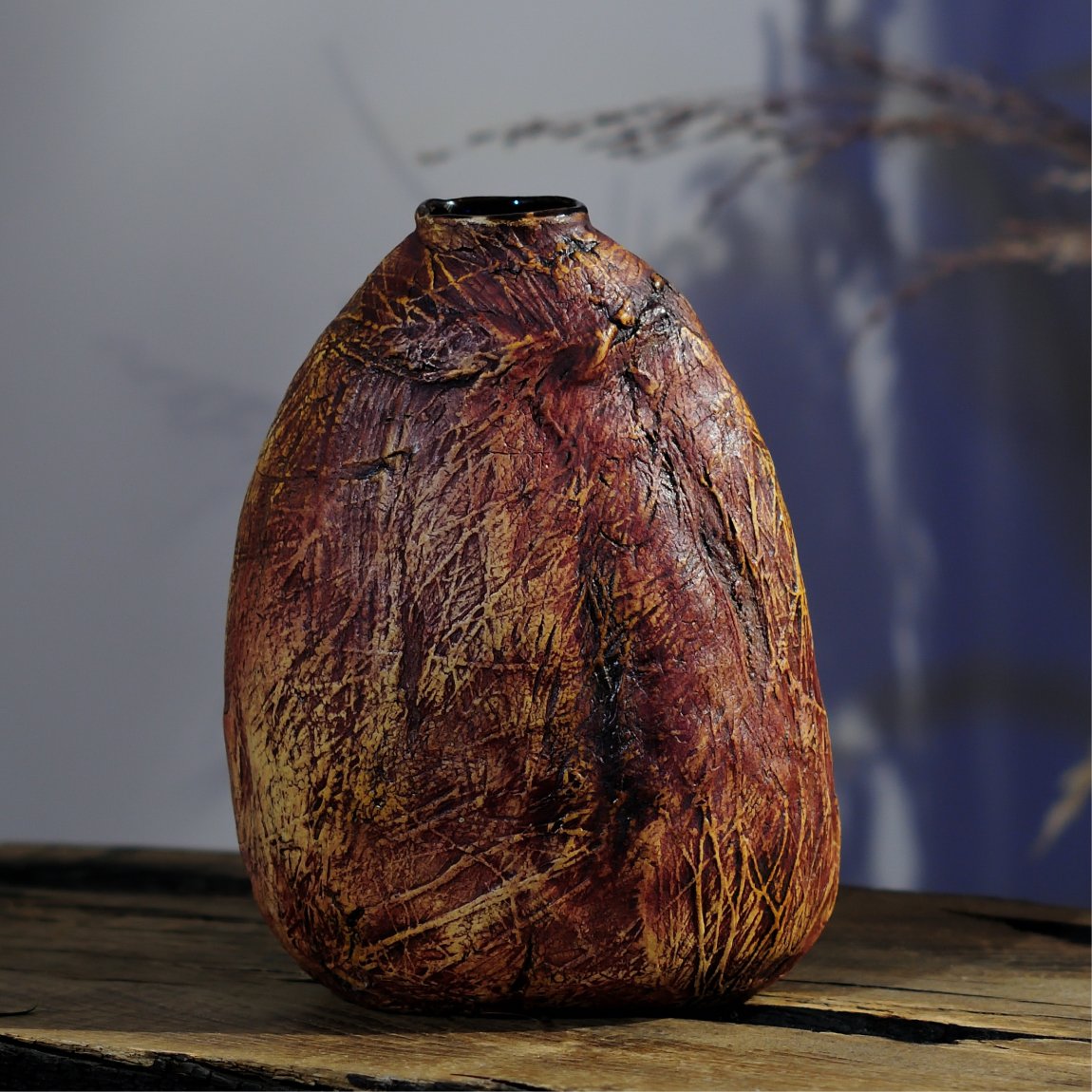 Side angle of sculptural ceramic vase with unique texture