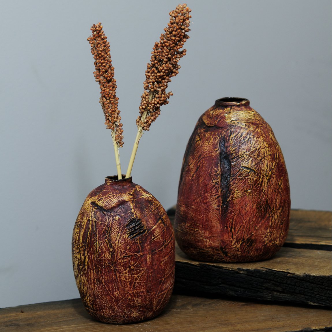 Wabi-sabi ceramic vase used as a floral centerpiece