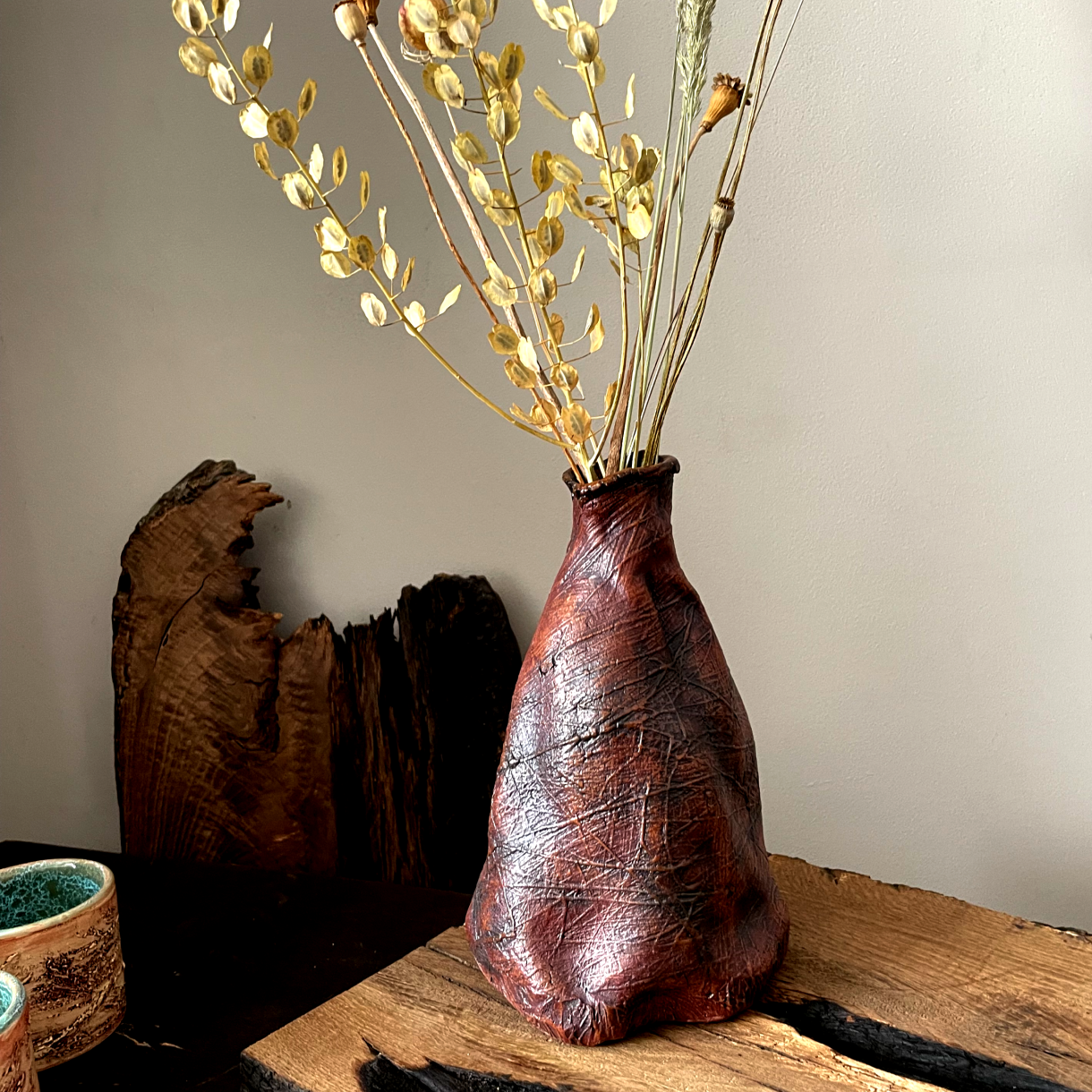 Glazed interior of one-of-a-kind ceramic vase
