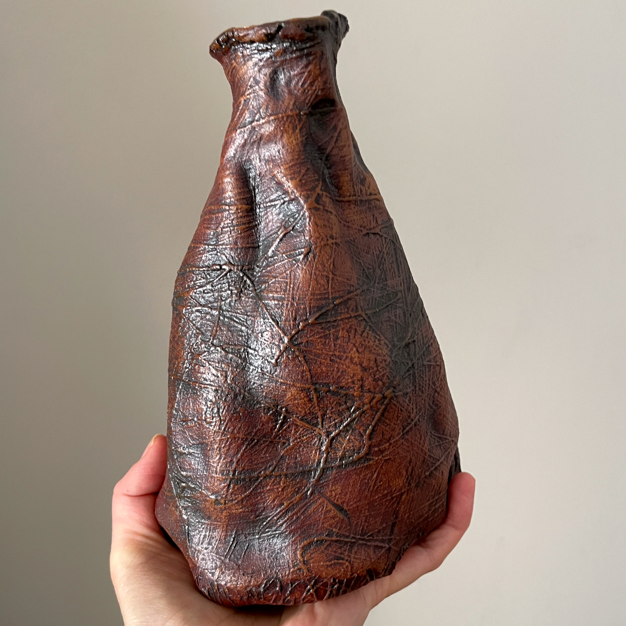 Glazed interior of one-of-a-kind ceramic vase