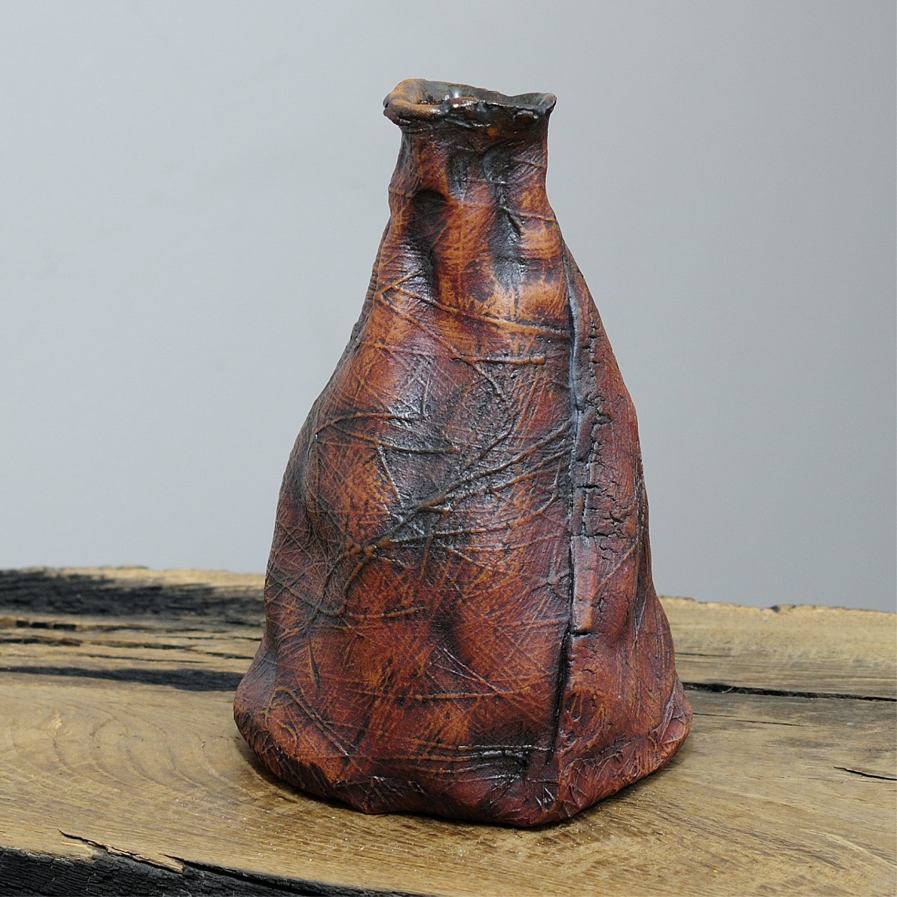 Ceramic vase with asymmetrical handbuilt form
