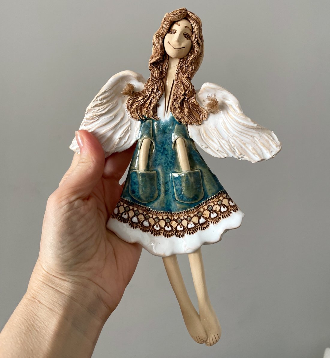 angel handmade wall sculpture view in hand