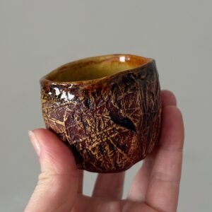 Front view of handmade pottery yunomi tea cup