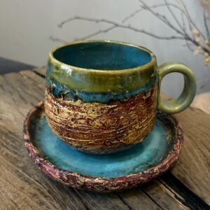 Handmade ceramic cup and saucer Synovir with textured stoneware surface