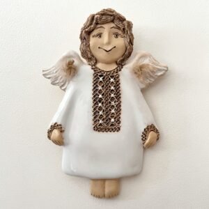 Decorative ceramic angel wall hanging in white glaze