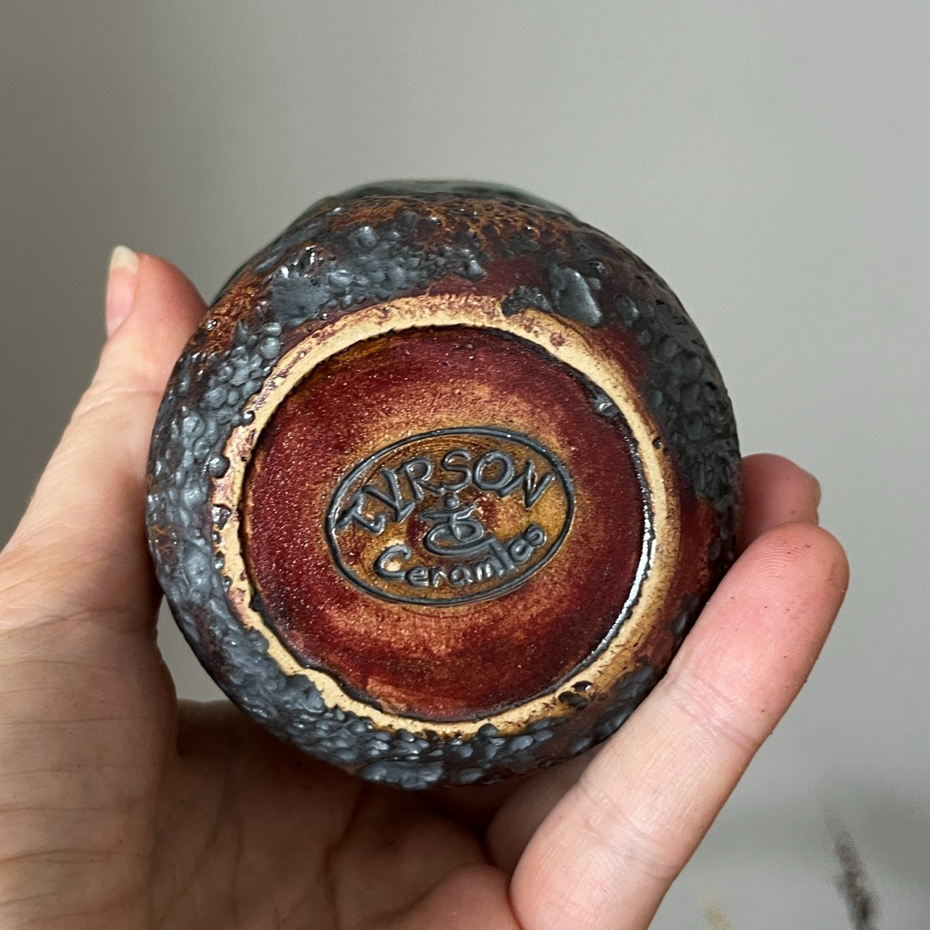 Bottom view of handmade ceramic coffee and tea cup from the LAVA series