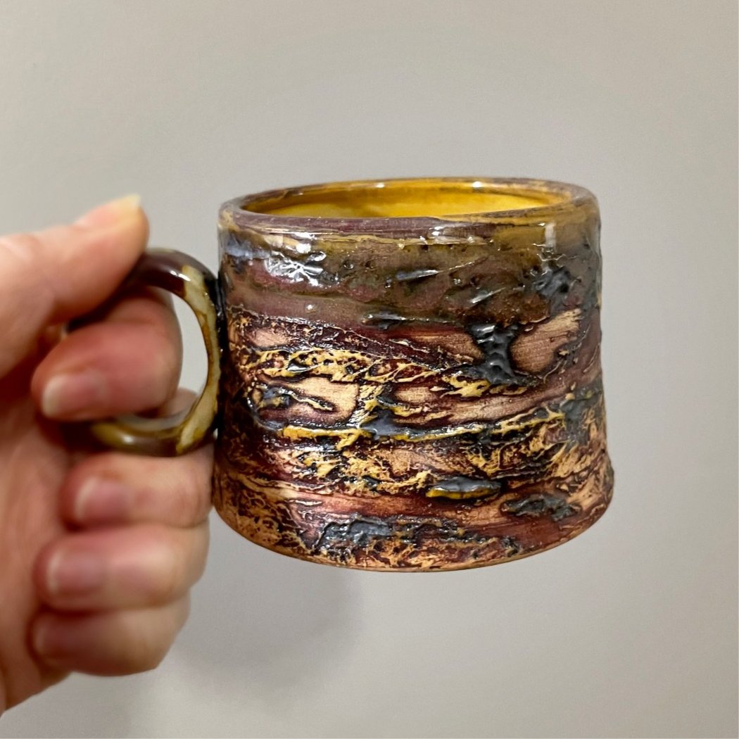 ceramic espresso cup with textured surface