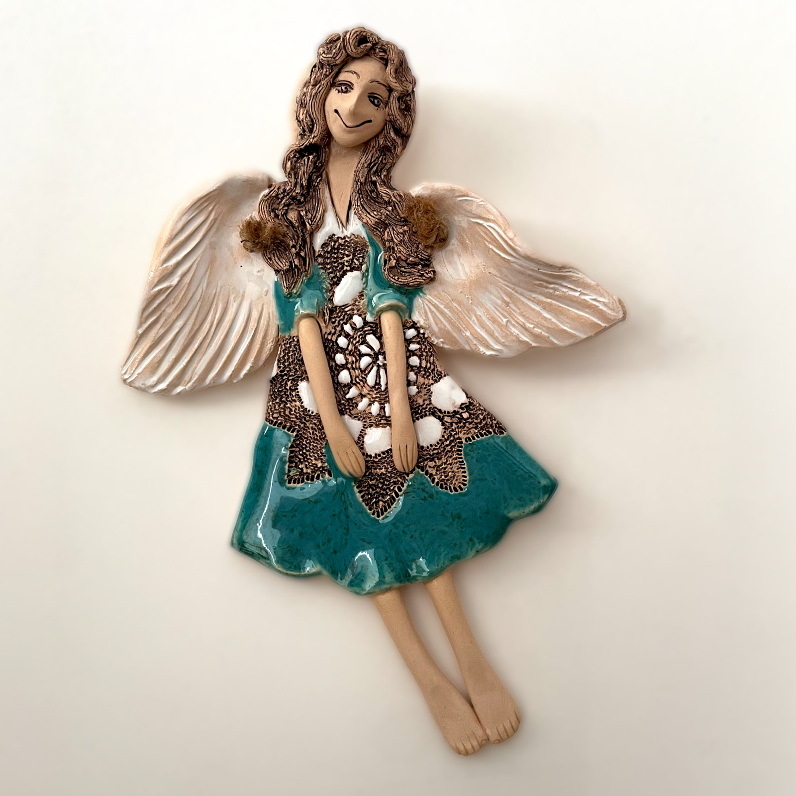 turquoise ceramic angel wall hanging