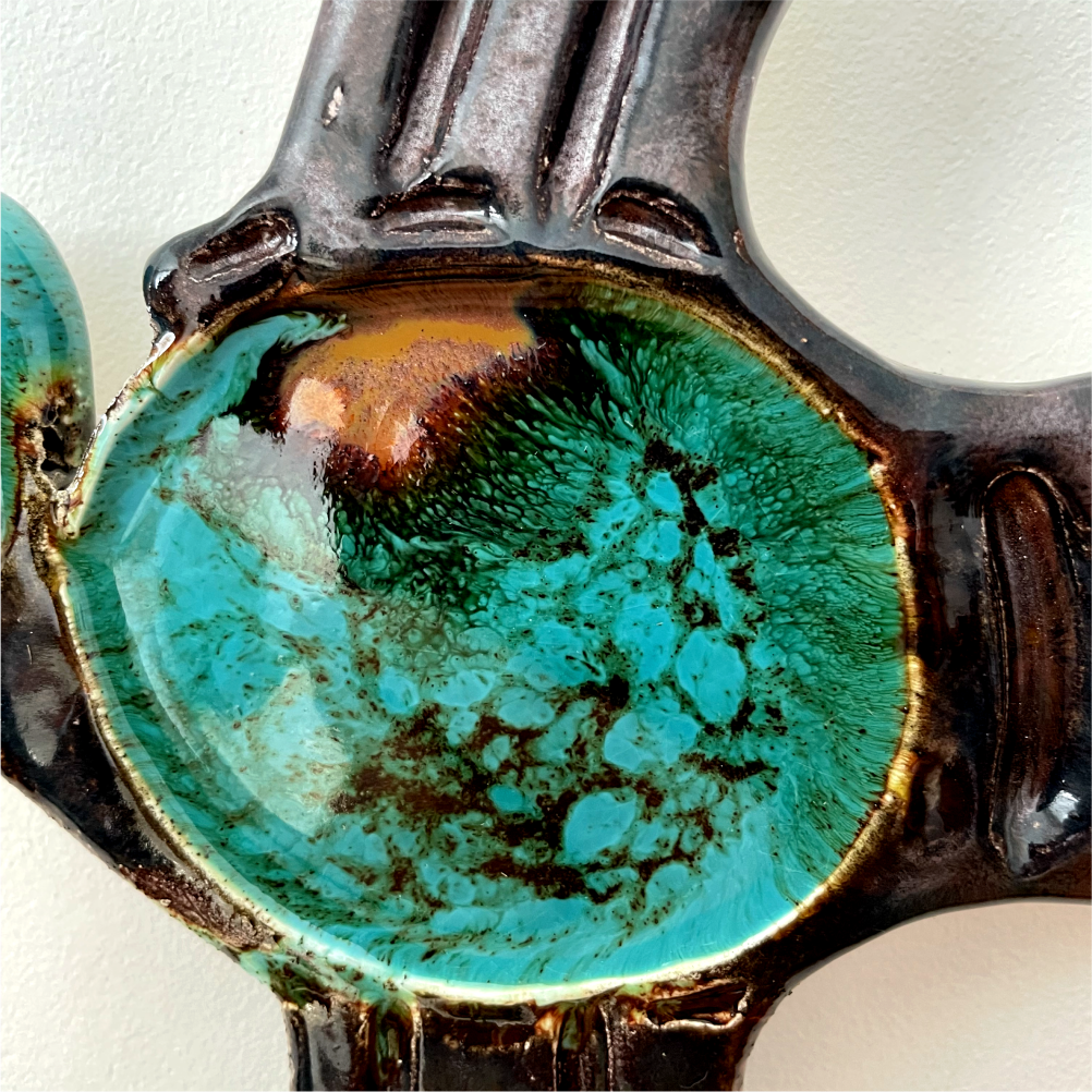 Symbolic ceramic bird wall decor