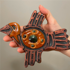 Handmade ceramic bird wall sculpture