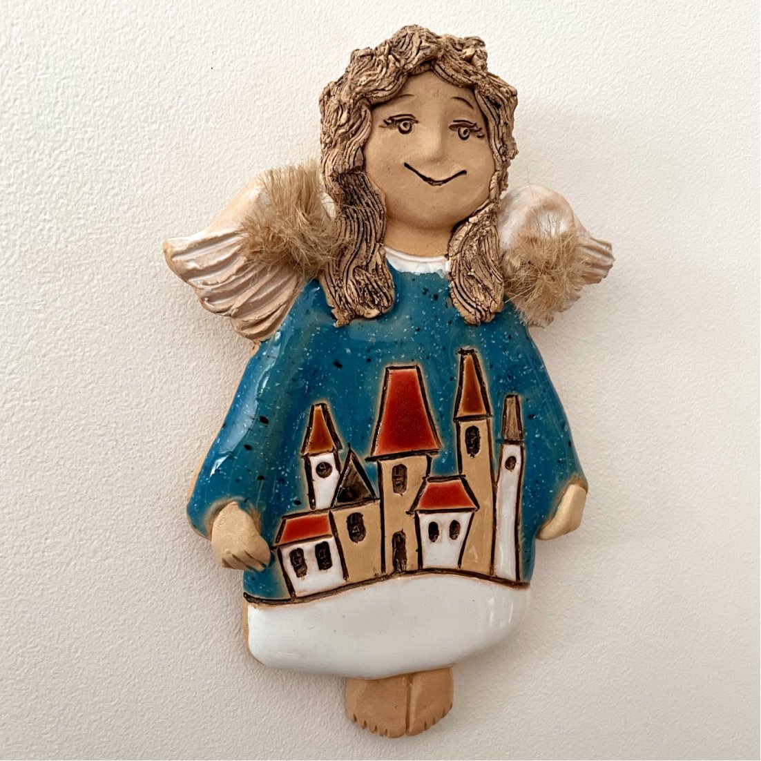 decorative ceramic angel wall art detail