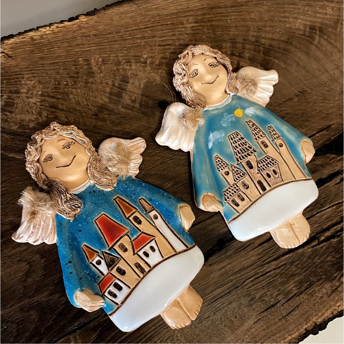 ceramic angel ornament with houses