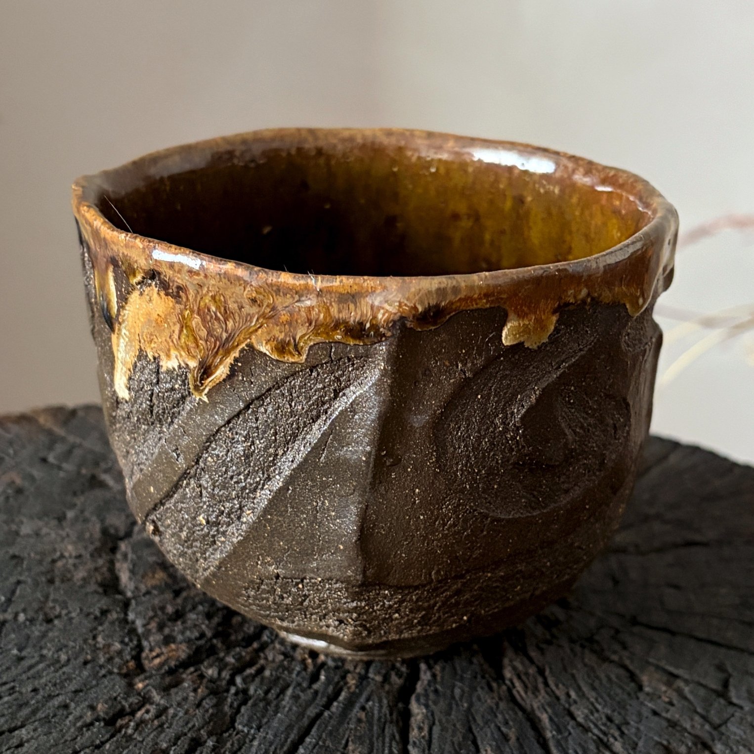 Rustic Kurinuki chawan with natural ash glaze