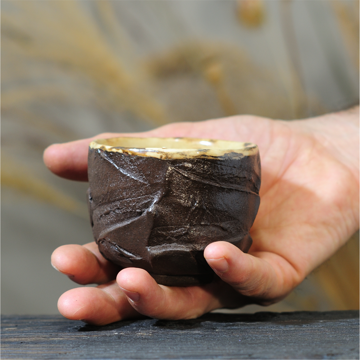 Black stoneware yunomi coffee cup carved by hand