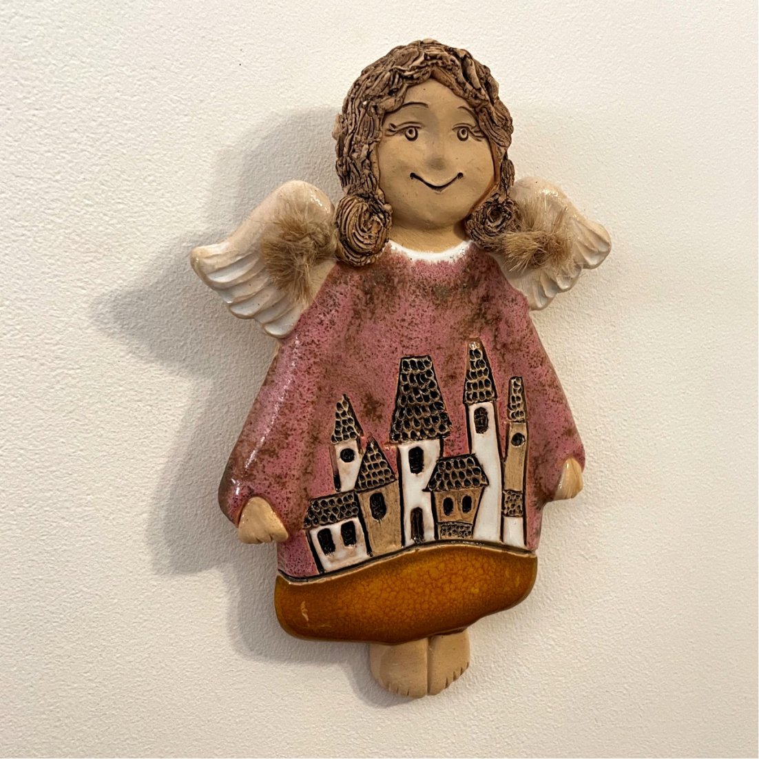decorative ceramic wall angel with houses
