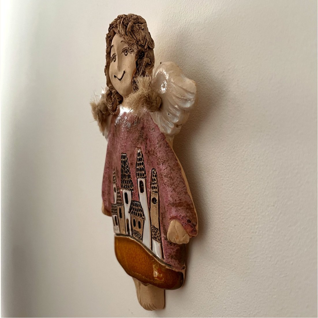 ceramic wall sculpture angel hanging on wall