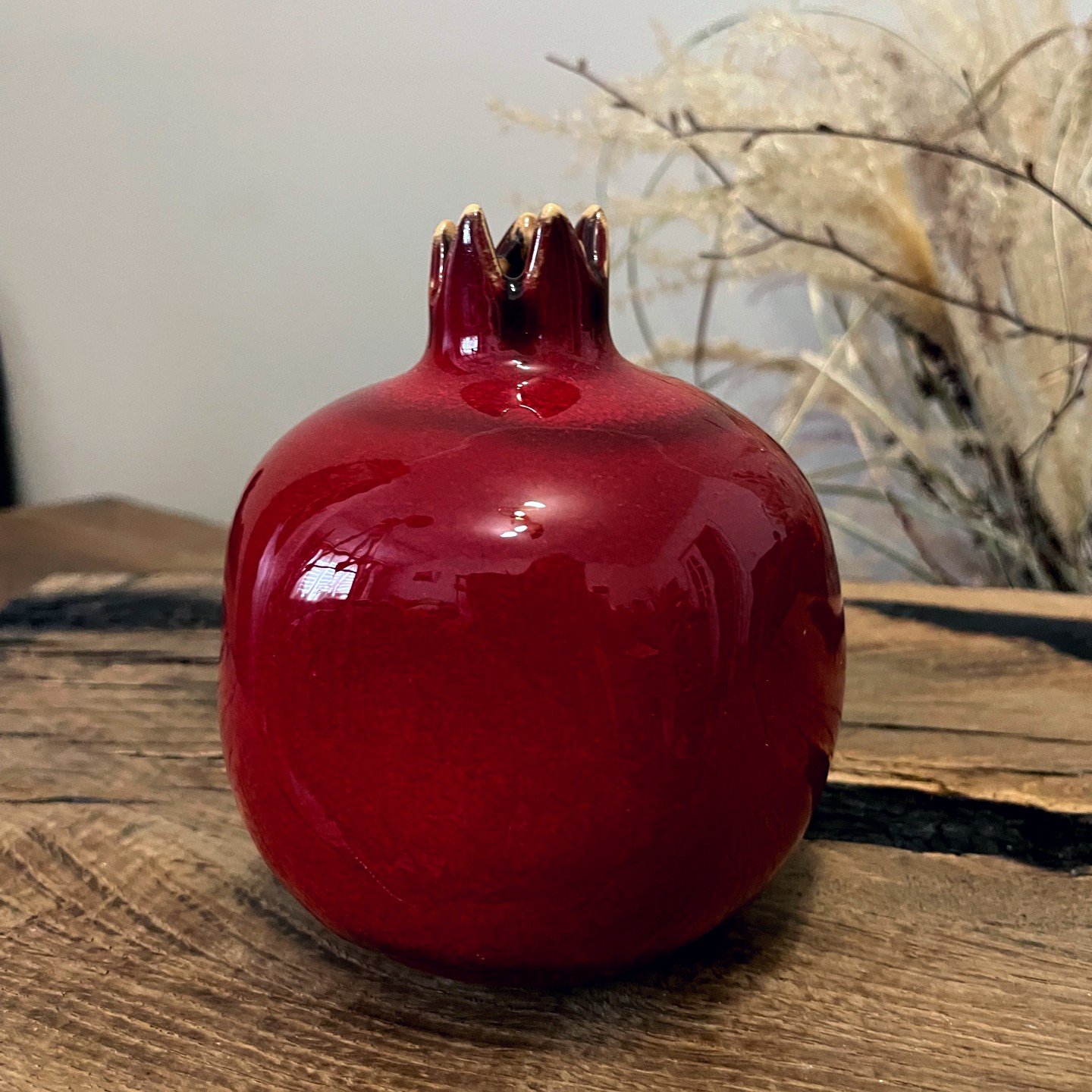 red ceramic pomegranate handmade pottery sculpture, decorative fruit object