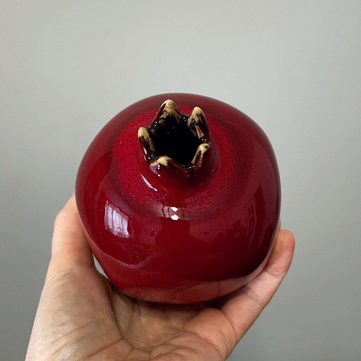 small red ceramic pomegranate sculpture, handmade pottery fruit decor