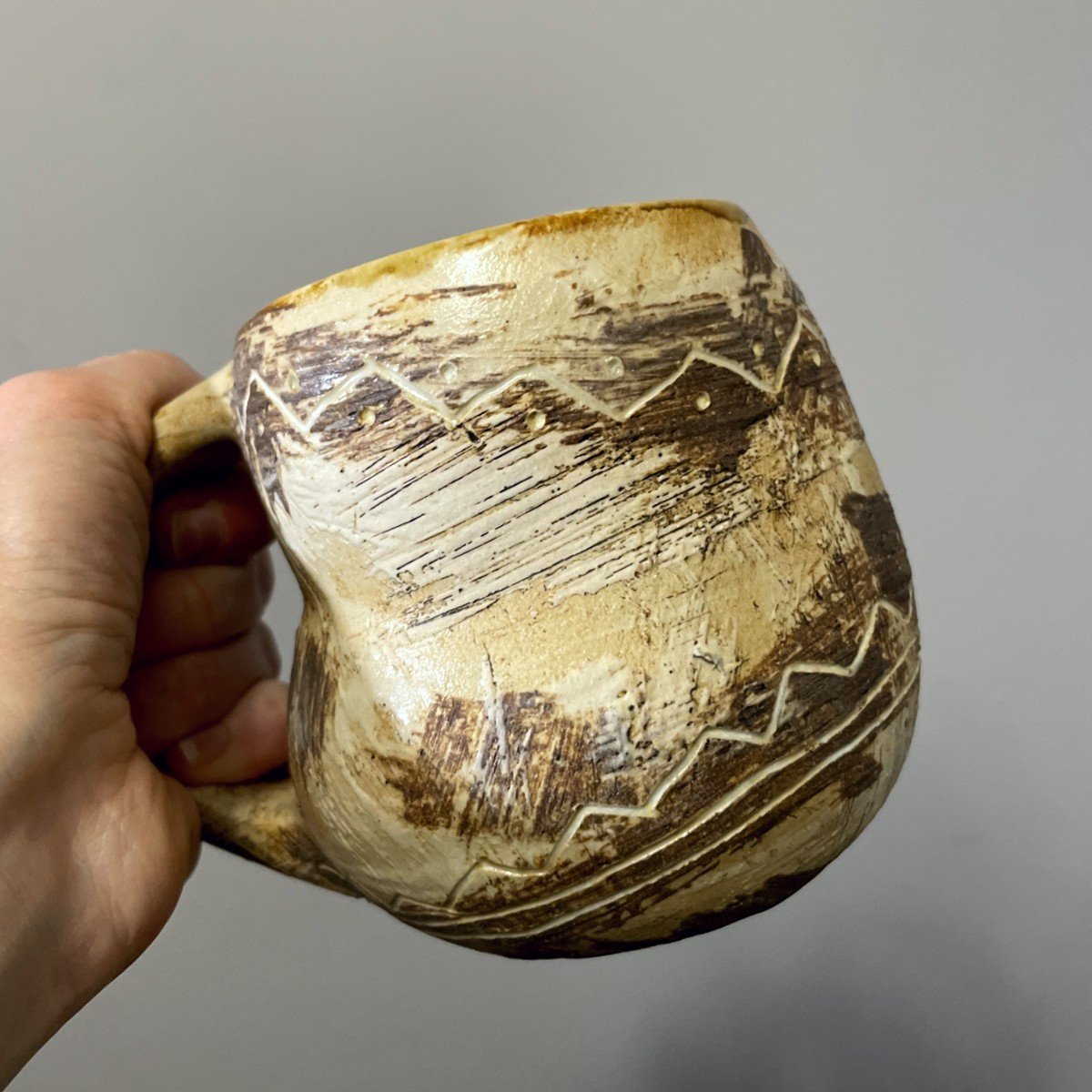 ceramic mug with textured surface handmade