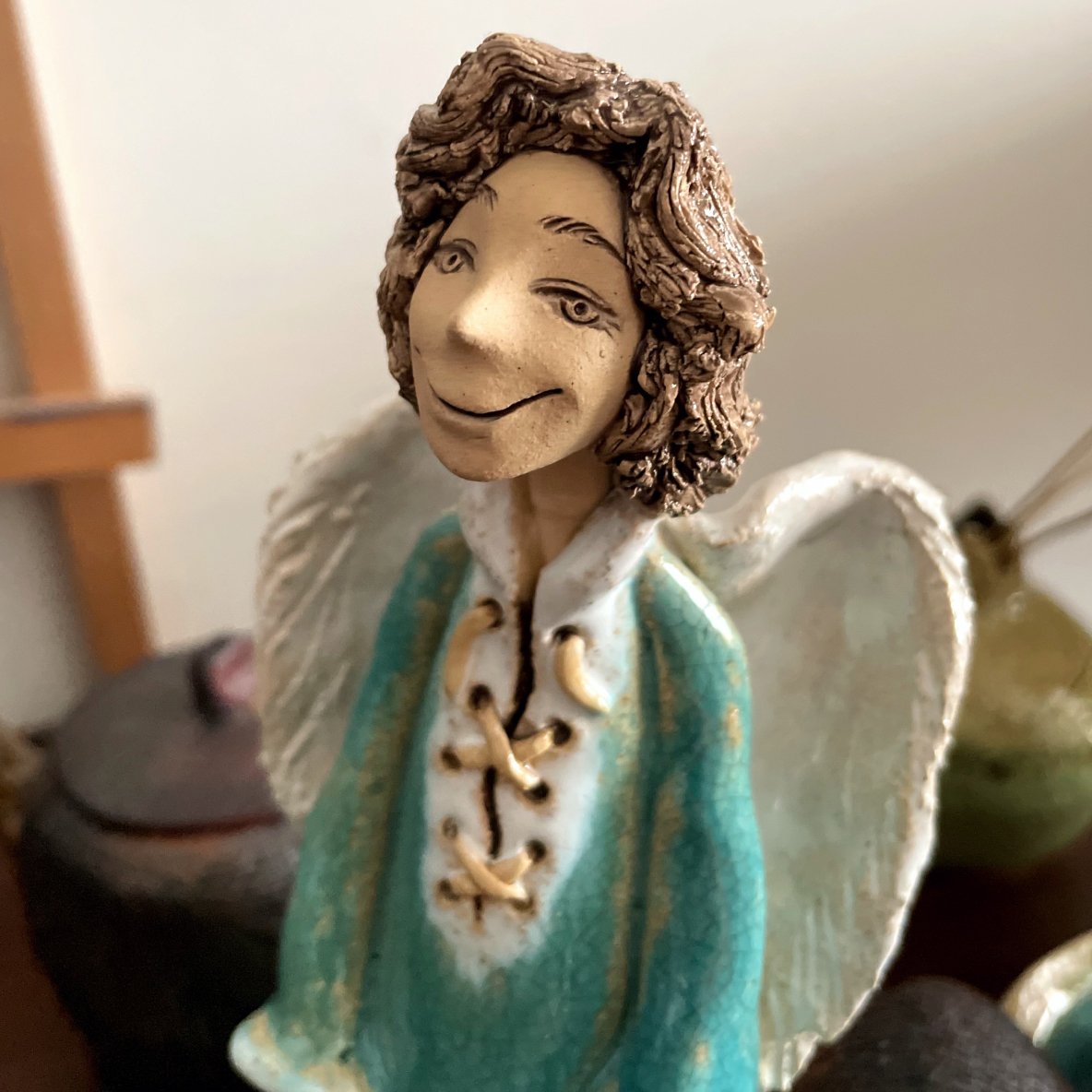 Ceramic angel sculpture, close-up detail