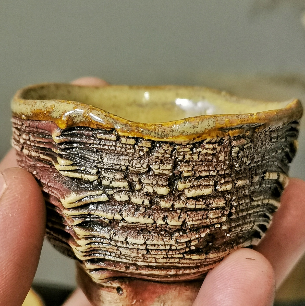 Small handmade ceramic tea bowl, side view, 50ml capacity