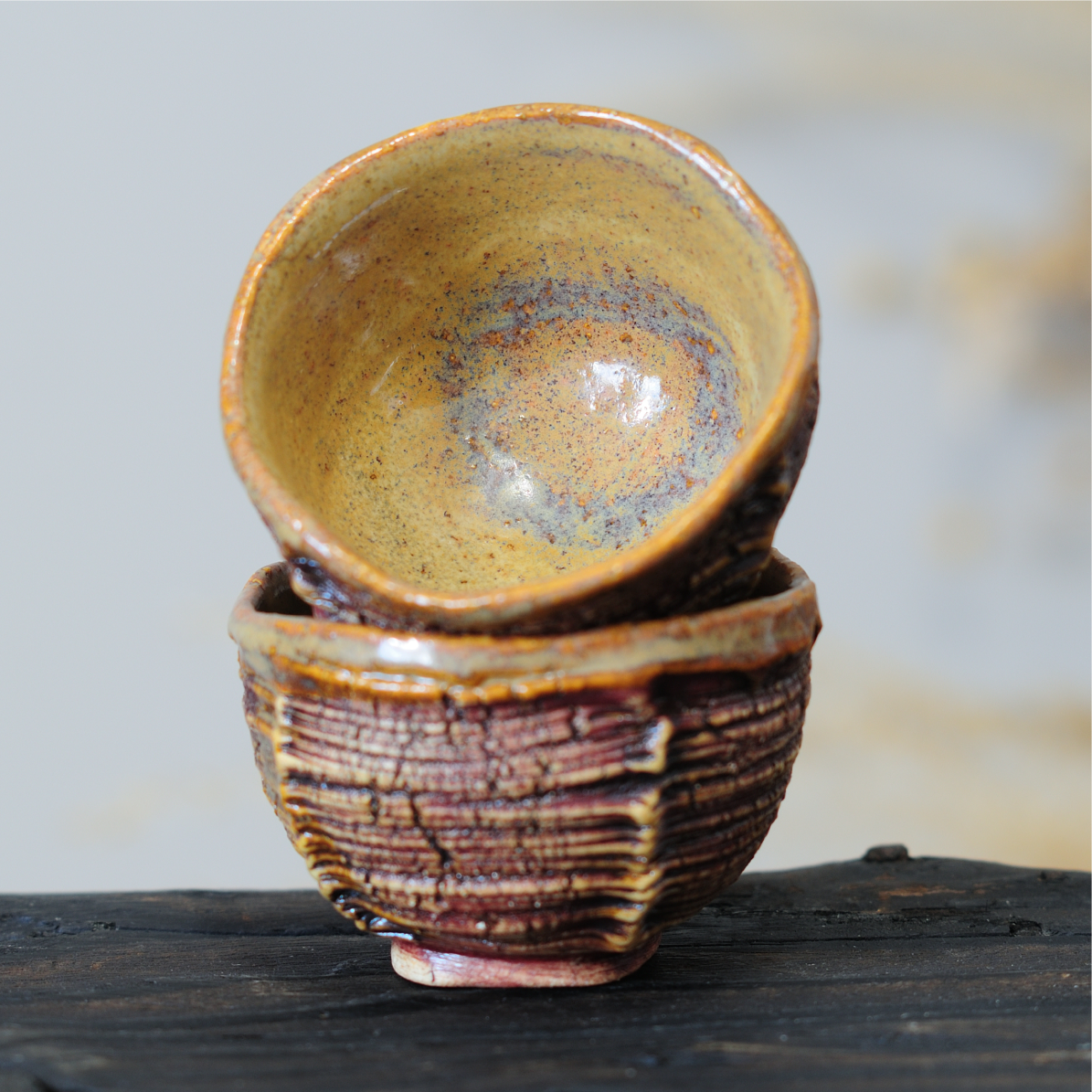 Rustic ceramic tea bowl from the Dune series, handbuilt
