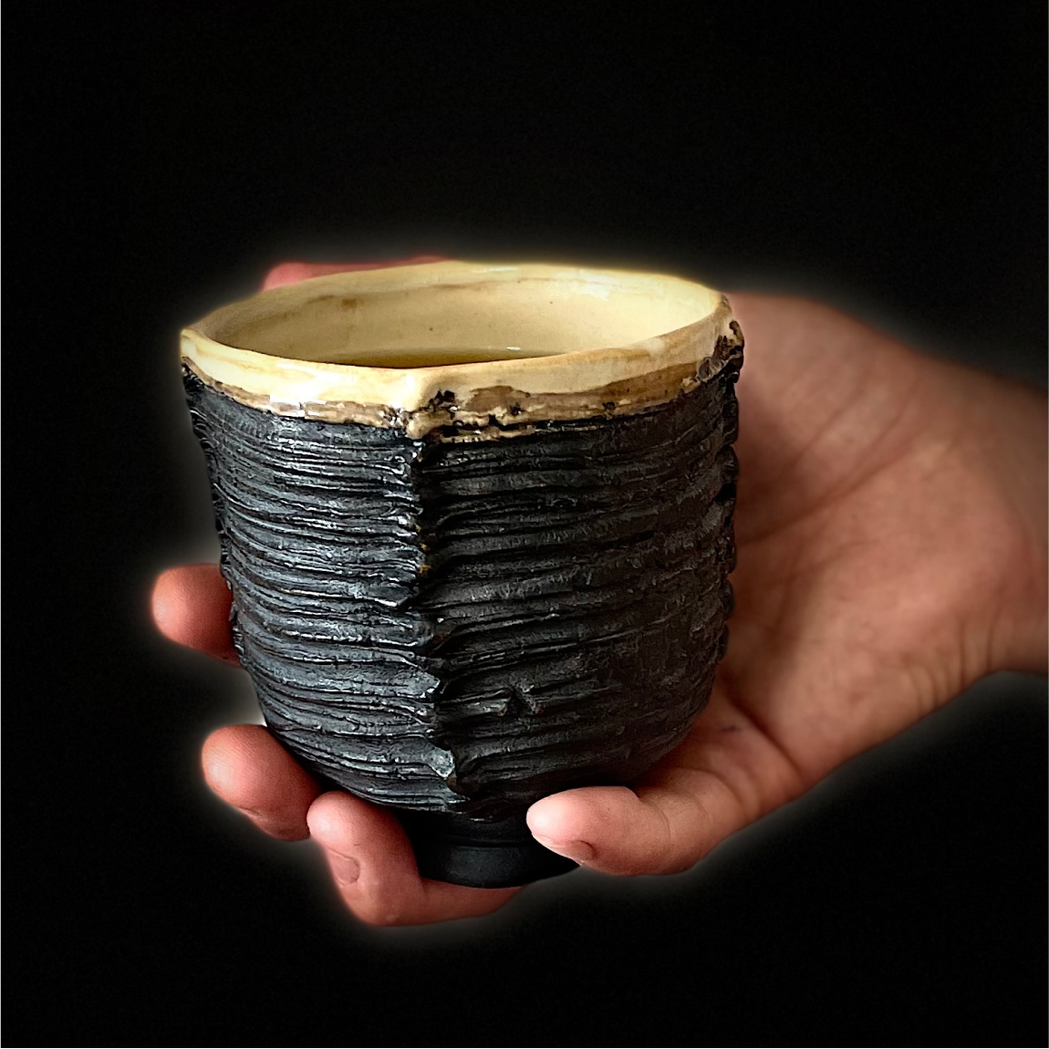 Stoneware yunomi cup with tactile surface, handmade ceramic drinkware