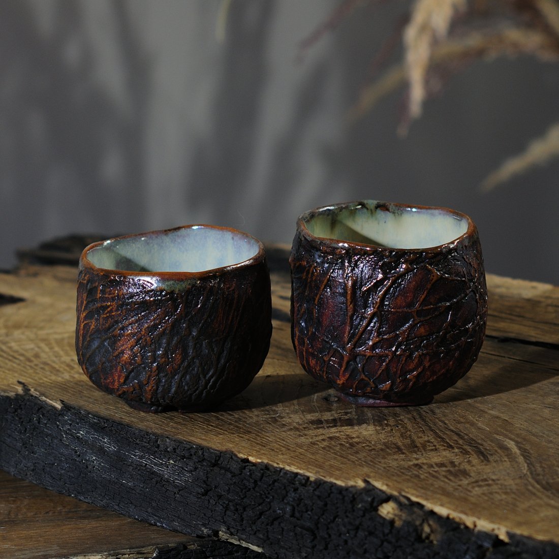 Textured pottery yunomi cup for tea and coffee in earth-tone glaze