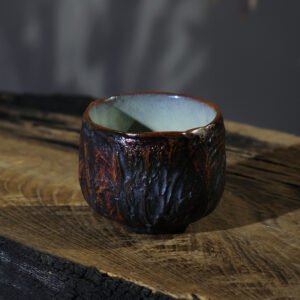 Handmade ceramic yunomi tea cup with textured stoneware surface 130 ml