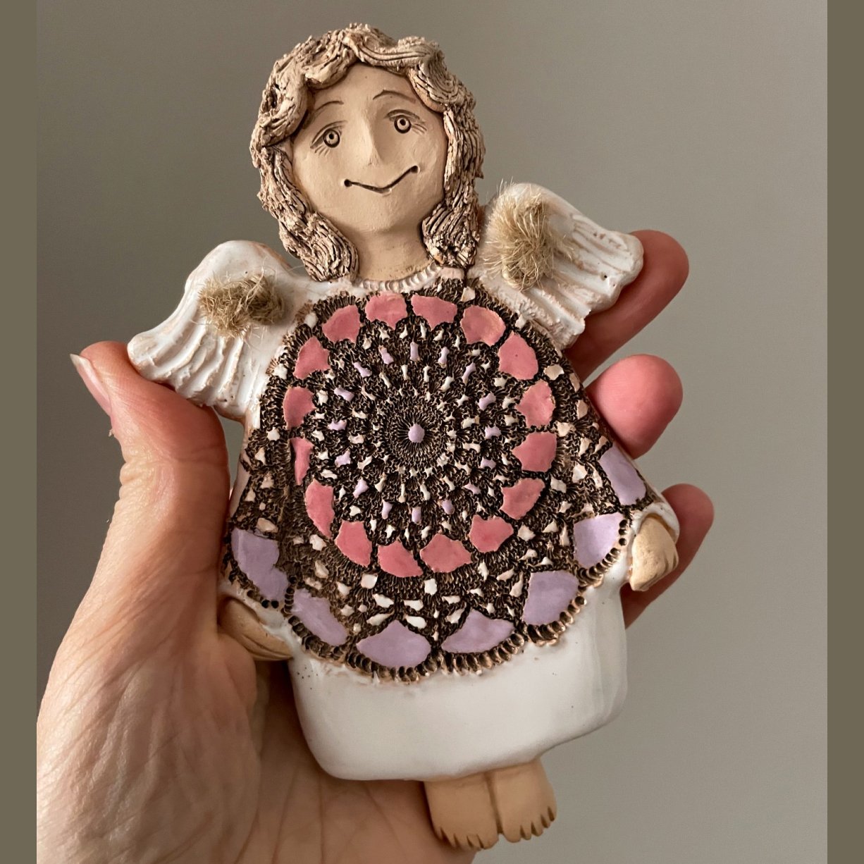 decorative ceramic wall hanging angel detail