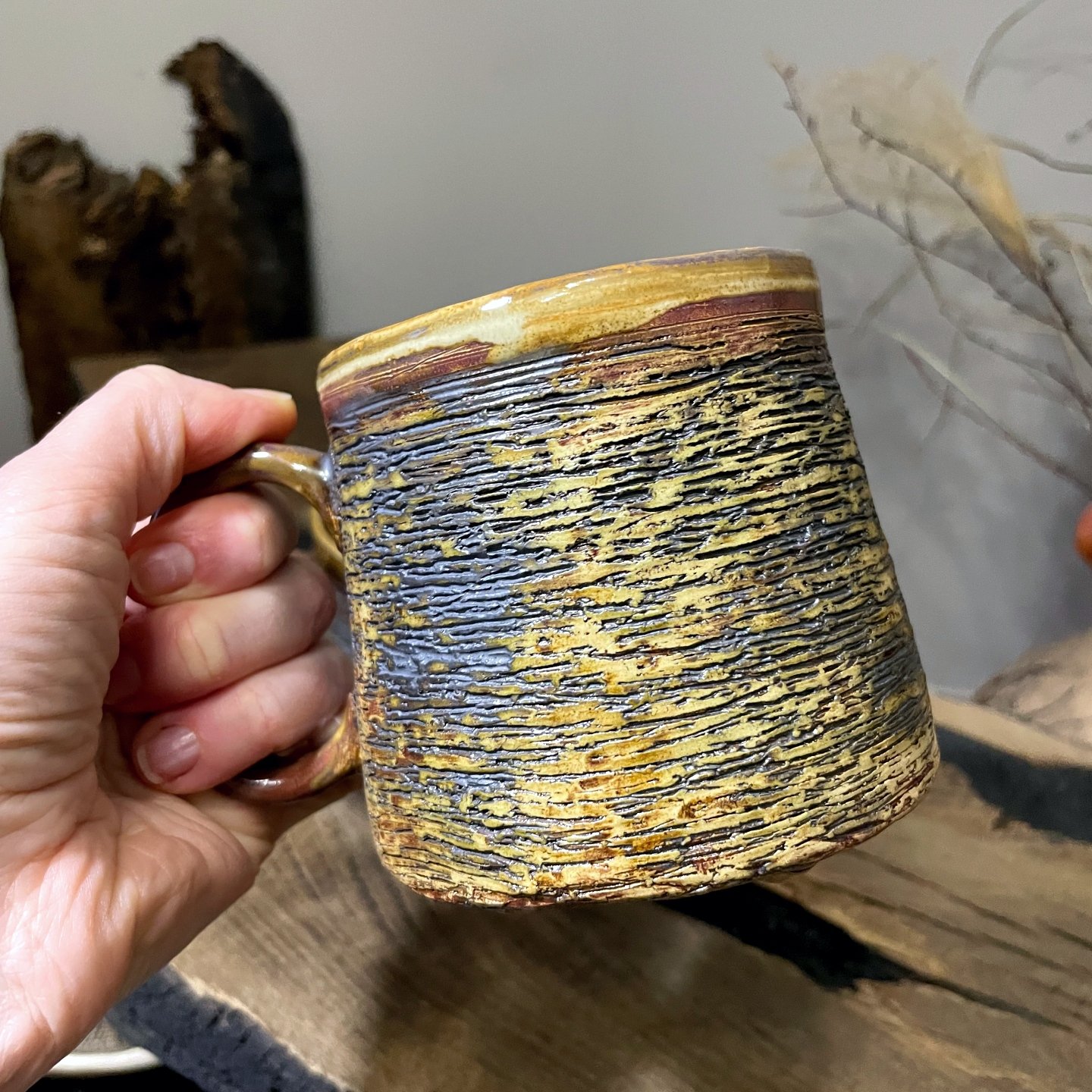 large ceramic mug with textured stoneware surface