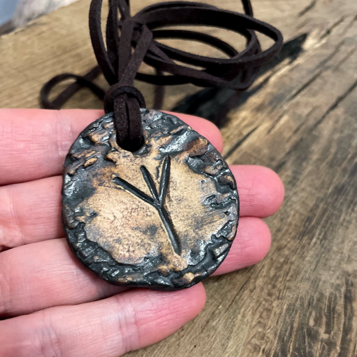 Stoneware pendant featuring the Algiz protection rune