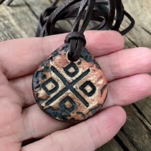 Handmade ceramic pendant with Makosh symbol