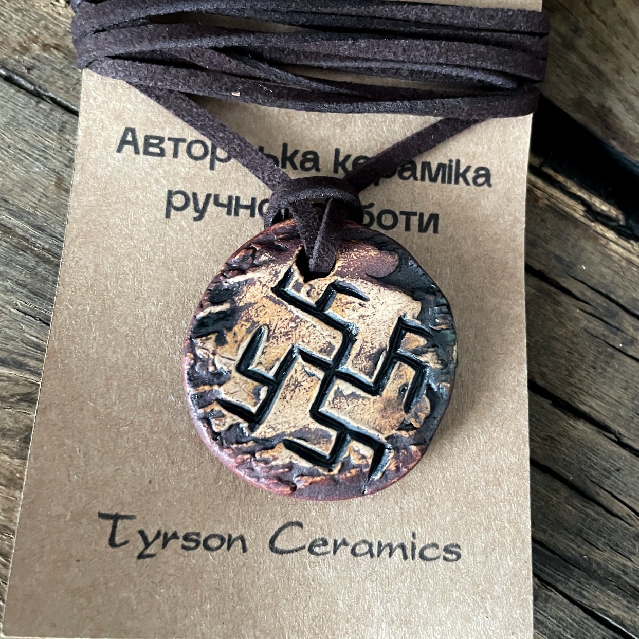 Stoneware pendant inspired by Slavic folklore