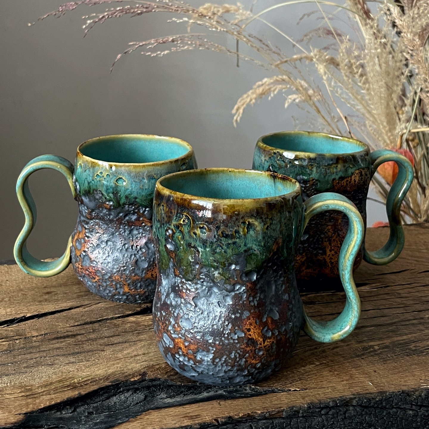 Handmade ceramic mug with unique textured finish