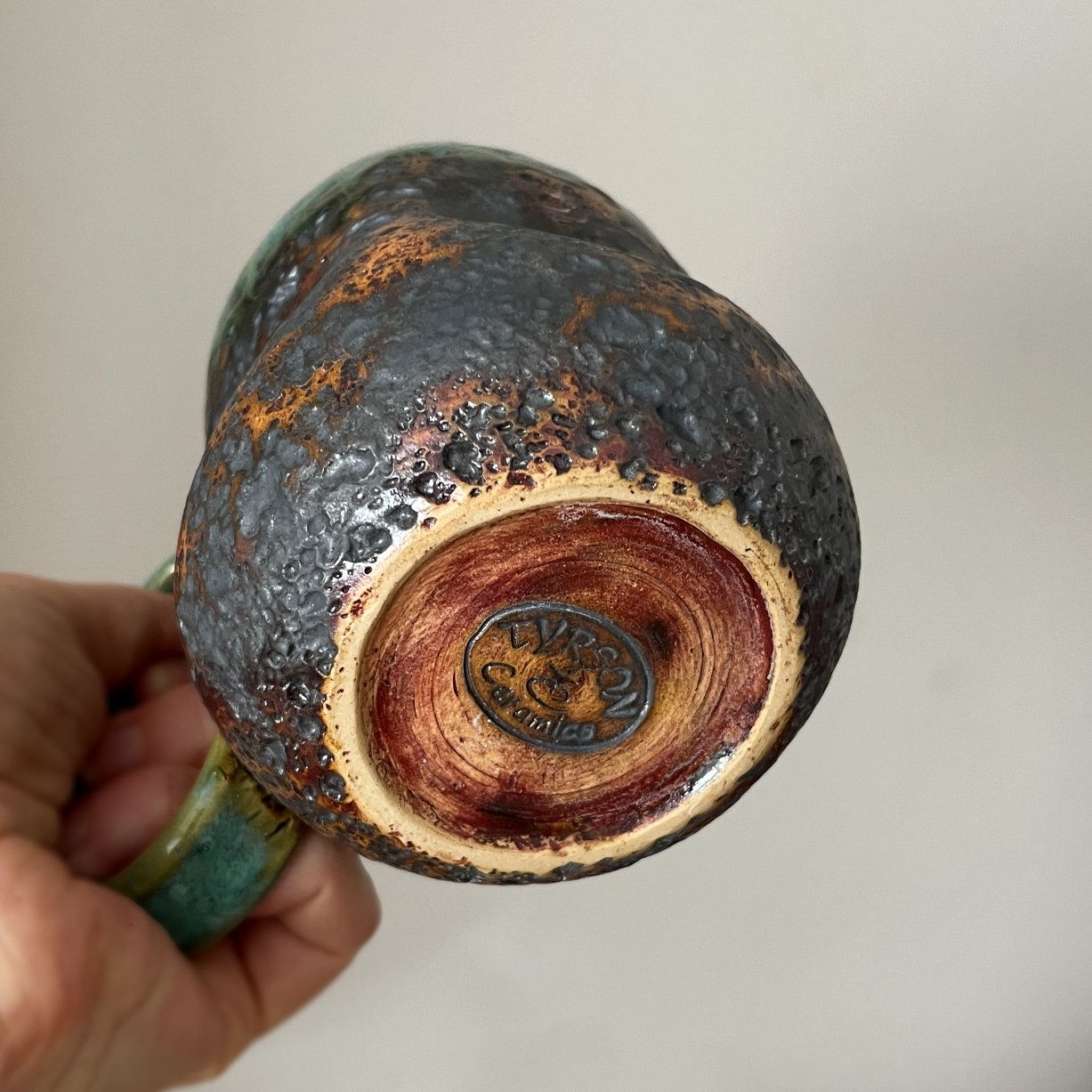 Bottom view of handmade ceramic mug from the LAVA series