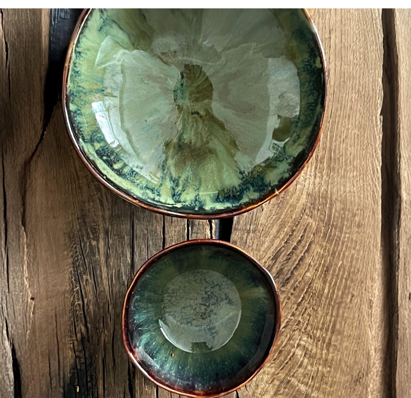 Top view of handmade ceramic bowl set with two matching bowls